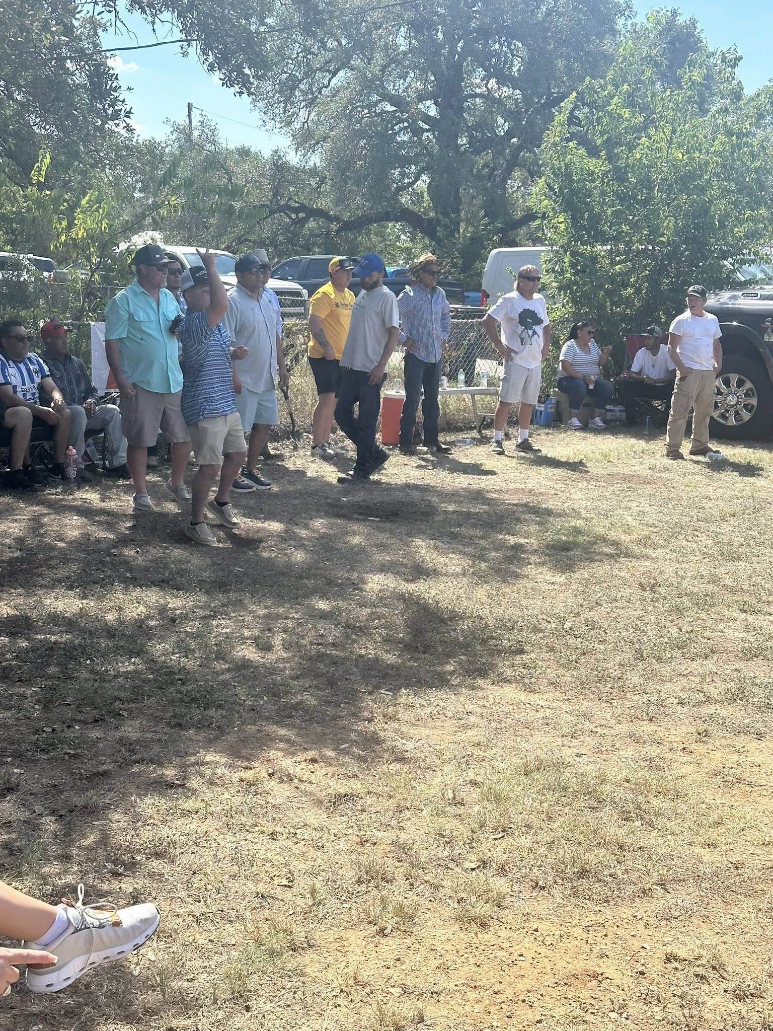 Teams competing in the Washer Tournament at the Oatmeal Festival in Bertram, Texas